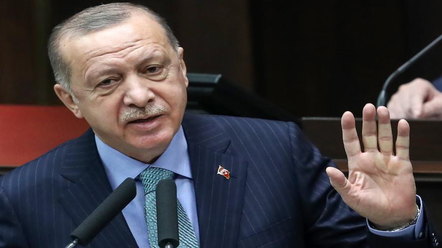 Recep Tayyip Erdogan, Turkish president and leader of the Justice and Development Party (AKP), delivers a speech during a meeting of members of the AKP at the Turkish Grand National Assembly in Ankara, Turkey, Feb. 24, 2021. 