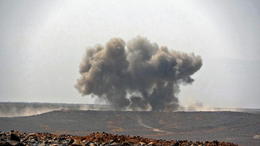 Smoke billows during Marib clashes