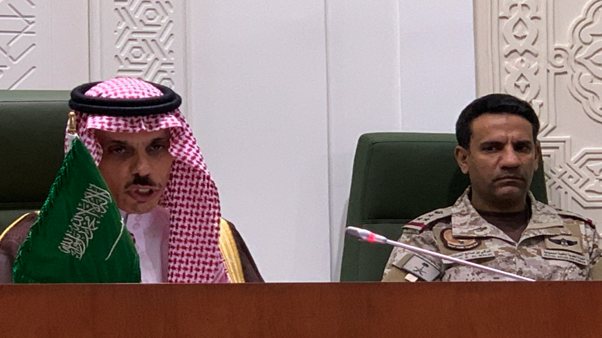 Saudi Foreign Minister Faisal bin Farhan (L) speaks during a press conference in the capital Riyadh on March 22, 2021, announcing an offer of a ceasefire with Yemen's Huthi rebels. - Saudi Arabia offered Yemen's Huthi rebels a "comprehensive" ceasefire, among a series of proposals aimed at ending a catastrophic six-year conflict. The proposals include "a comprehensive ceasefire across the country under the supervision of the United Nations", a government statement said. (Photo by Fayez Nureldine / AFP)