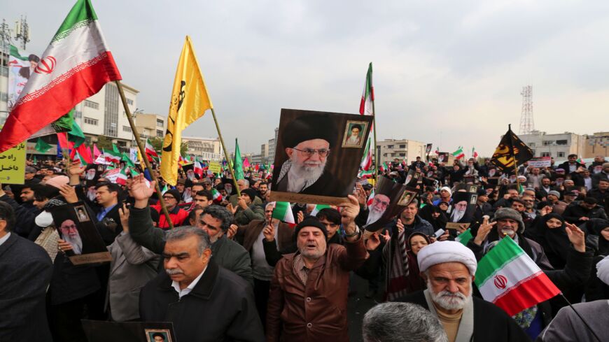 Iranians holding national flags and pictures of the Islamic republic's supreme leader, Ayatollah Ali Khamenei, take part in a pro-government demonstration in the capital, Tehran's, central Enghelab Square on Nov. 25, 2019, to condemn days of "rioting" that Iran blames on its foreign foes. In a shock announcement 10 days ago, Iran raised the price of petrol by up to 200%, triggering nationwide protests in a country whose economy has been battered by US sanctions.