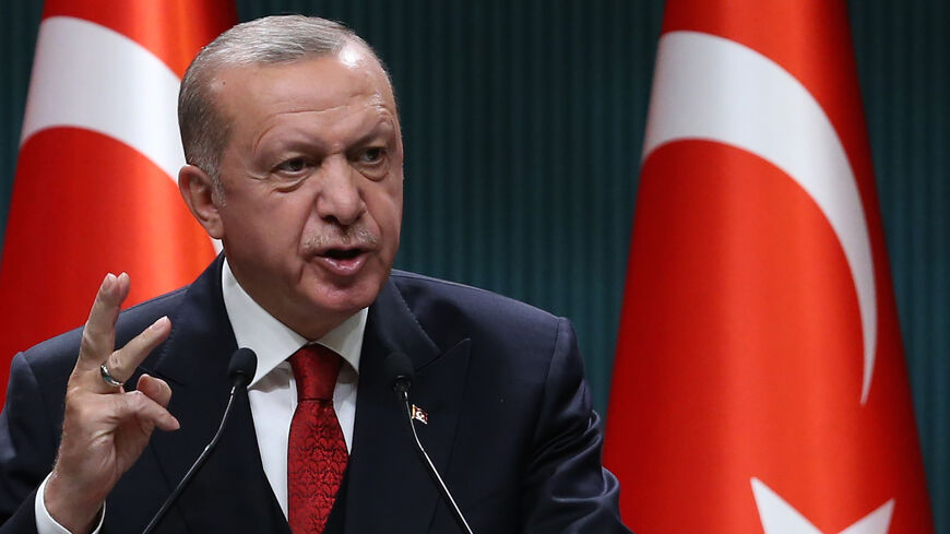 President of Turkey, Recep Tayyip Erdogan gestures as he gives a press conference after the cabinet meeting at the Presidential Complex in Ankara, Turkey, on Sept. 21, 2020.