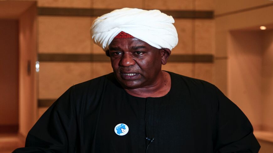 Sudanese businessman Abu al-Qassem Bortoum speaks during an inter-faith event to promote religious tolerance in Sudan's capital, Khartoum, on Feb. 6, 2021. The Sudanese businessman defended hosting the event in the Muslim-majority country that also included Jews, Christians and Hindus. Critics from an Islamist group had argued such events would heighten tensions a month after Sudan's landmark decision to normalize ties with Israel in a US-brokered deal.