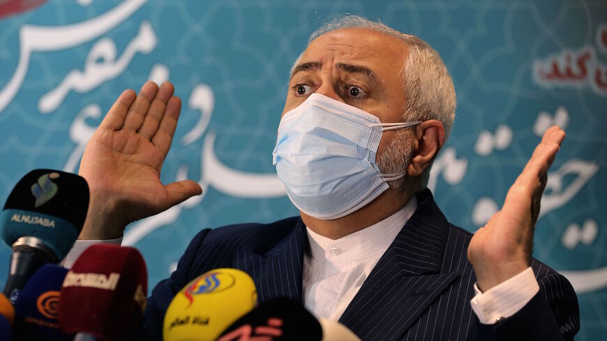 Iranian Foreign Minister Mohammad Javad Zarif speaks during a press conference at the International Conference on the Legal-International Claims of the Holy Defense in the capital Tehran on Feb. 23, 2021. 