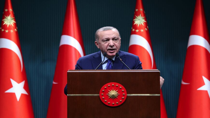 Turkish President Recep Tayyip Erdogan delivers a speech following an evaluation meeting at the Presidential Complex in Ankara on April 5, 2021. Erdogan accused dozens of retired admirals of eyeing a "political coup" by attacking his plans for a canal linking the Black Sea to the Mediterranean.