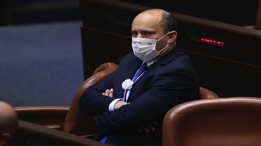 Israeli Knesset member Naftali Bennett attends the swearing-in ceremony of Israel's Knesset (parliament) in Jerusalem, on April 6, 2021.