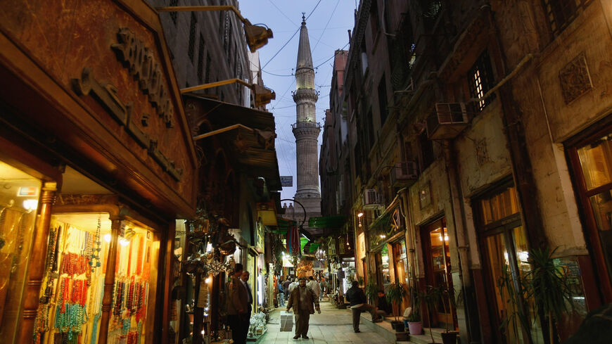 The minaret of Sayyidna al-Husayn mosque looks down on Khan al-Khalili bazaar, Cairo, Egypt, Feb. 24, 2009.