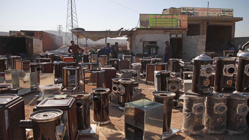 Pistachio-powered heaters are displayed for sale along a street in al-Dana town in the northwestern province of Idlib, Syria, Dec. 18, 2019.