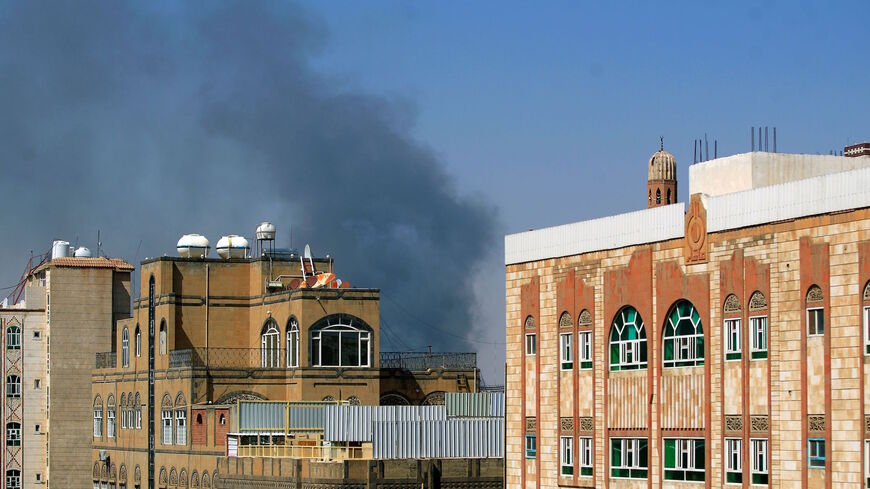 Smoke billows following a reported airstrike by the Saudi-led coalition in the Yemeni capital Sanaa, on March 7, 2021.