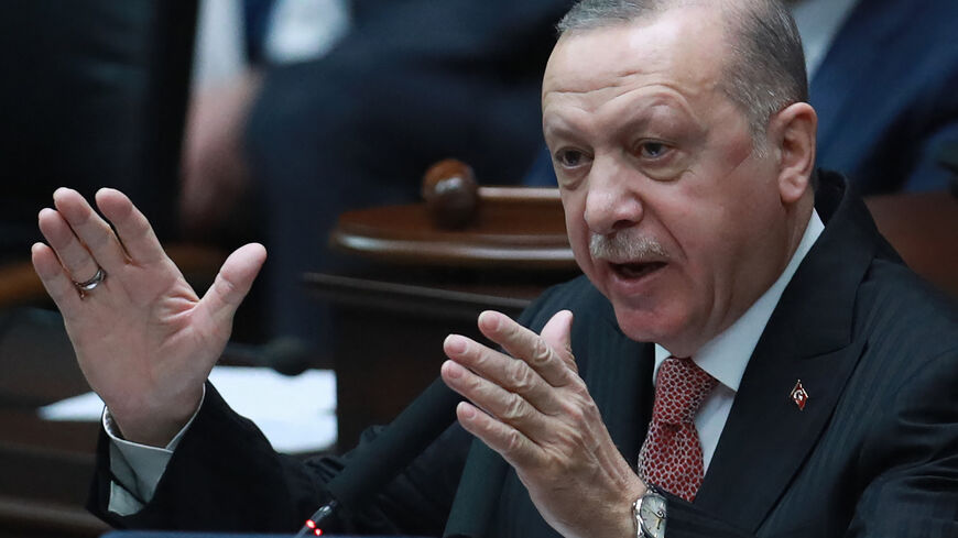 Turkish President and leader of Justice and Development (AK) Party Recep Tayyip Erdogan speaks during his ruling AK Party's group meeting at the Grand National Assembly of Turkey (GNAT), in Ankara, on April 21, 2021. 