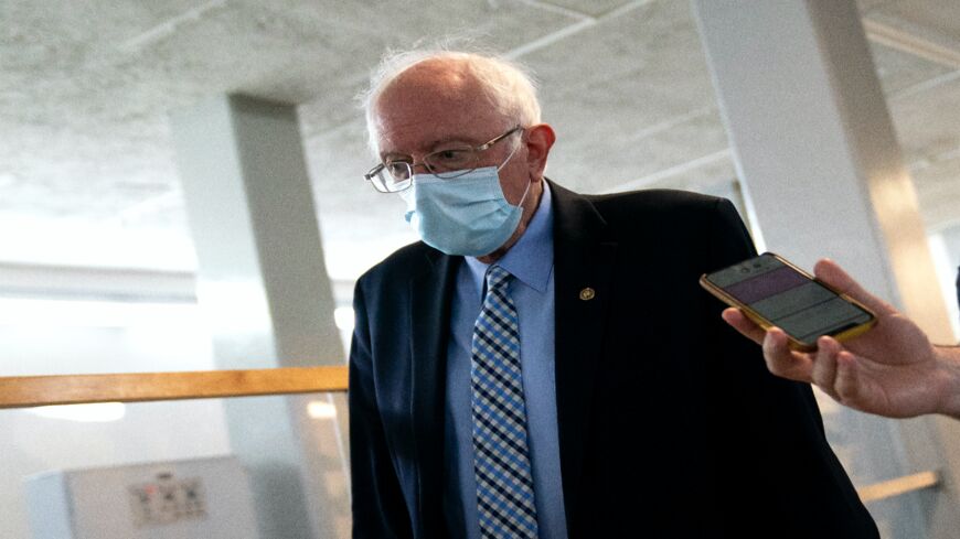 US Sen. Bernie Sanders (I-VT) speaks to members of the media in the Senate Subway on April 29, 2021, in Washington, DC.