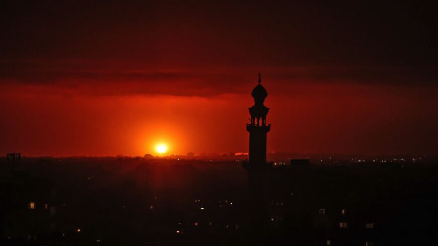 A picture shows an Israeli airstrike in the southern Gaza Strip, controlled by the Palestinian Islamist movement Hamas, on May 10, 2021. Israel launched deadly airstrikes on Gaza in response to a barrage of rockets fired by the Islamist movement Hamas amid spiraling violence sparked by unrest at Jerusalem's Al-Aqsa Mosque compound. 