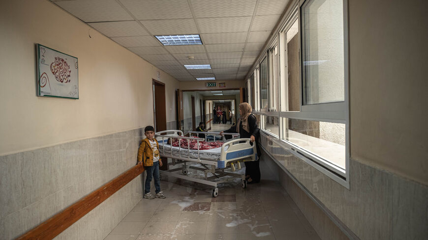 A Palestinian child who was wounded in overnight Israeli air strikes on the Gaza Strip, receives treatment at Al-Shifa Hospital on May 19, 2021 in Gaza City, Gaza.  