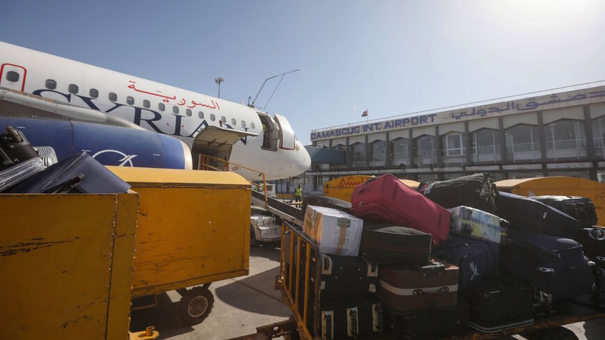 A Syrian airline plane is pictured on the tarmac at the Damascus International airport in the Syrian capital on Oct. 1, 2020. 