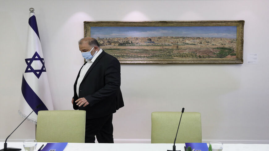 Israeli Arab politician, leader of the United Arab list, Mansour Abbas attends consultations with Israeli President Reuven Rivlin (unseen) on who might form the next coalition government, at the president's residence, Jerusalem, April 5, 2021.