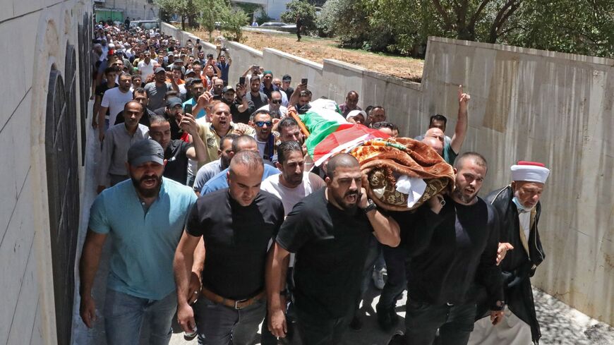Nizar Banat's body carried