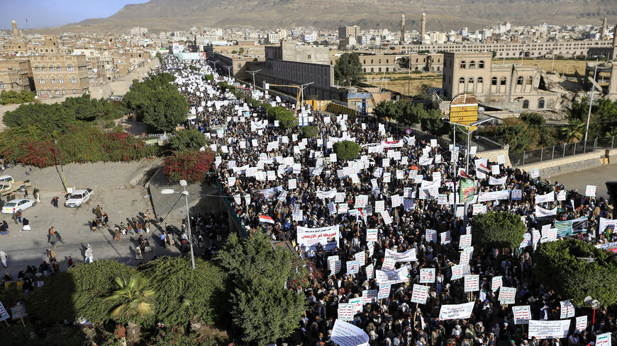 Supporters of the Houthi movement attend a rally denouncing the United States and the outgoing Trump administration's decision to apply the "terrorist" designation to the Iran-backed movement, in the Houthi-held capital Sanaa, Yemen, Jan. 25, 2021.