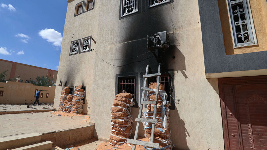 A picture taken on March 26, 2021, shows a damaged and abandoned villa complex of members of a Libyan family who commanded a militia that traumatised Tarhuna town, 80Km southeast of the capital. The Kaniyat were a team of six brothers who traumatized the town of Tarhuna in war-ravaged Libya, systematically eliminating those seen as opposing their militia — including killing the families. 