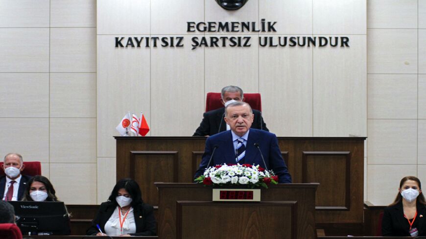 A handout picture published by the parliament of the self-proclaimed Turkish Republic of Northern Cyprus (TRNC) shows Turkish President Recep Tayyip Erdogan speaking.