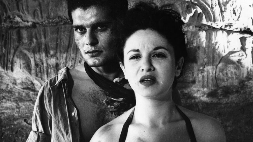 Omar Sharif and Faten Hamama in a scene from the 1954 Egyptian film "Siraa Fil-Wadi"