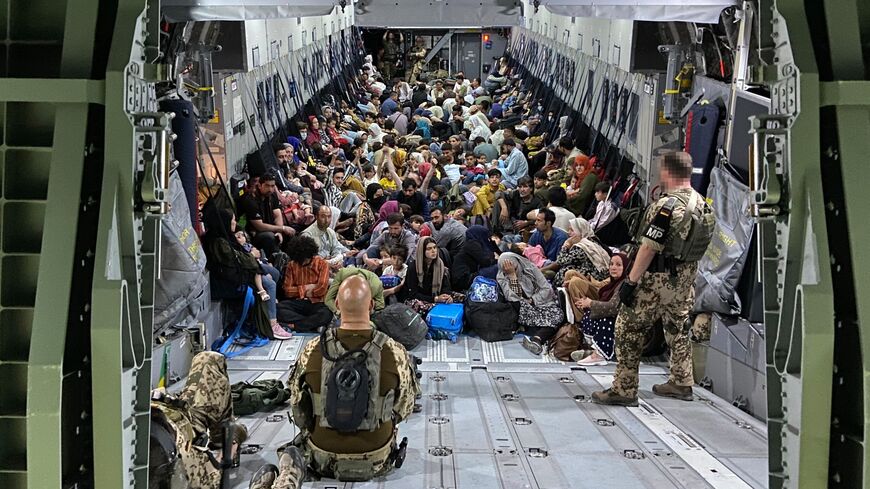 Afghan evacuees in German military plane