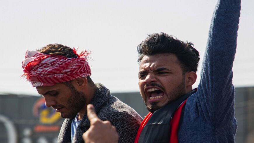 Iraqi demonstrators chant slogans during an anti-government demonstration by Basra University students in the southern city of Basra, on Feb. 11, 2020.