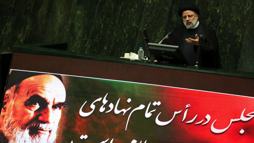 Iran's President Ebrahim Raisi speaks before parliament in the capital, Tehran, on Aug. 25, 2021.