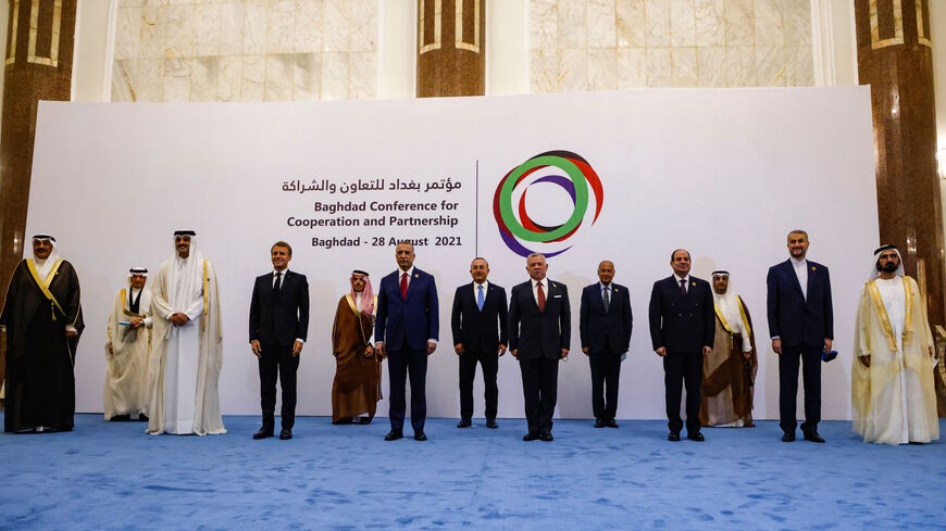 (L to R) Kuwait's Foreign Minister Sheikh Sabah al-Khaled al-Sabah, OIC Secretary-General Yousef bin Ahmed Al-Othaimeen, Qatars Emir Sheikh Tamim al-Thani, French President Emmanuel Macron, Saudi Foreign Minister Faisal bin Farhan, Iraq's Prime Minister Mustafa al-Kadhemi, Turkey's Foreign Minister Mevlut Cavusoglu, Jordan's King Abdullah II, Arab League Secretary General Ahmed Aboul-Gheit, Egypt's President Abdel Fattah al-Sisi, secretary-general of the Gulf Cooperation Council (GCC) Nayef al-Hajraf, Irani