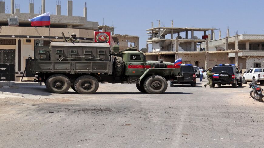 A picture shows Russian troops in the Syrian district of Daraa al-Balad in Syria's southern province of Daraa, on Sept. 1, 2021. 