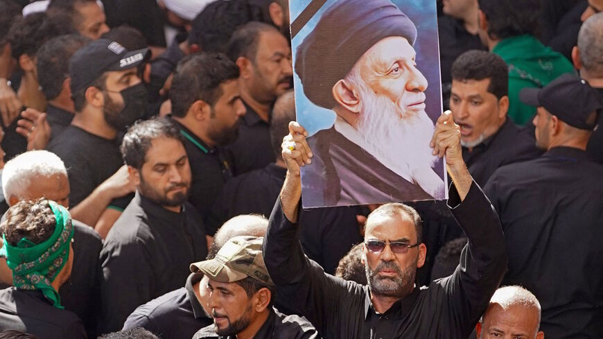 Iraqis attend the funeral of Ayatollah Mohammad Said al-Hakim, one of Iraq's top four Shiite clerics, at the Imam Ali shrine in Iraq's central holy shrine city of Najaf on Sept. 5, 2021.