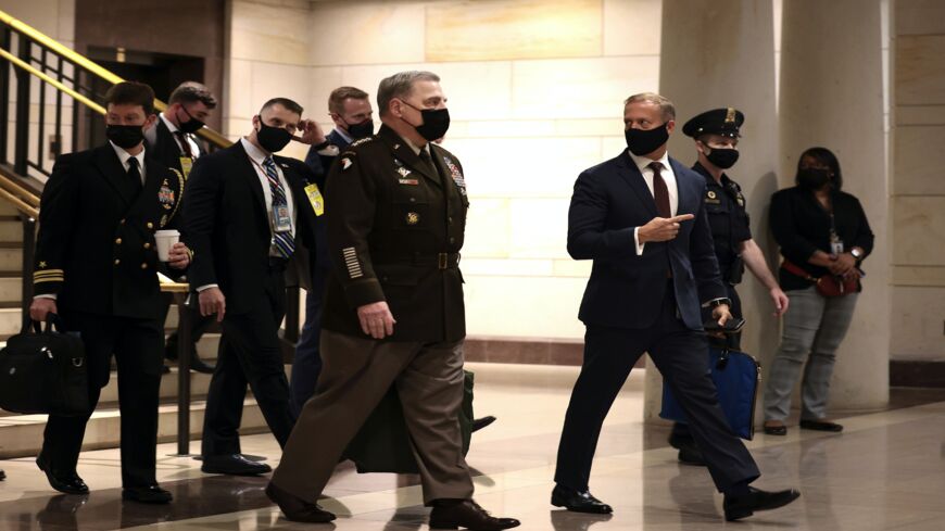 Chairman of the Joint Chiefs of Staff Gen. Mark Milley (C) arrives at the US Capitol.