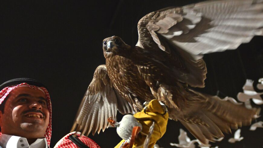 An exhibitor shows a falcon during the first Saudi Falcons and Hunting Exhibition in the capital, Riyadh, on Dec. 7, 2018.