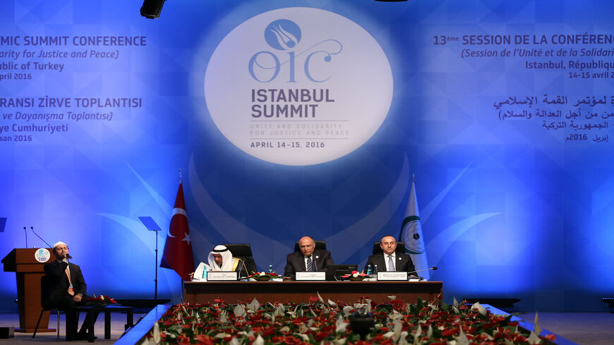 Secretary-General of the Organization of Islamic Cooperation (OIC) Iyad bin Amin Madani (L), Egyptian Foreign Minister Sameh Shoukry and Turkish Foreign Minister Mevlut Cavusoglu attend the 13th OIC Summit at Istanbul Congress Center, Turkey, April 14, 2016.