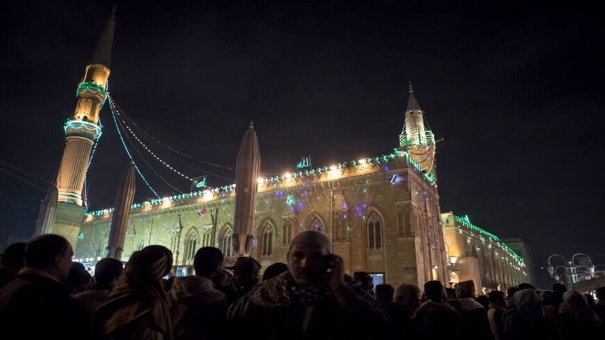 Muslims attend a ritual ceremony to commemorate the Mawlid of Imam Hussein, grandson of the Prophet Muhammad, outside Al-Hussein Mosque, Cairo, Egypt, Jan. 16, 2018.