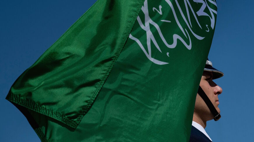 A color guard holds Saudi Arabia's flag while waiting for Saudi Vice Minister of Defense Prince Khalid bin Salman arrival for an honor cordon at the Pentagon August 29, 2019, in Washington, DC. 