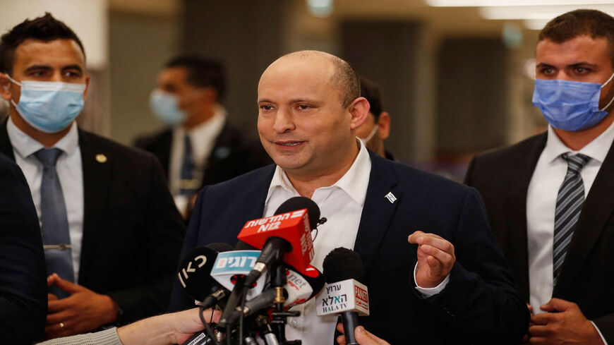 Israeli Prime Minister Naftali Bennett speaks to reporters following a session at the Knesset, Jerusalem, Nov. 4, 2021.