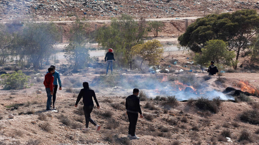 Demonstrators burn tyres during a general strike following the death of a protester and the reopening of a rubbish dump, Aguereb, Tunisia, Nov. 10, 2021.