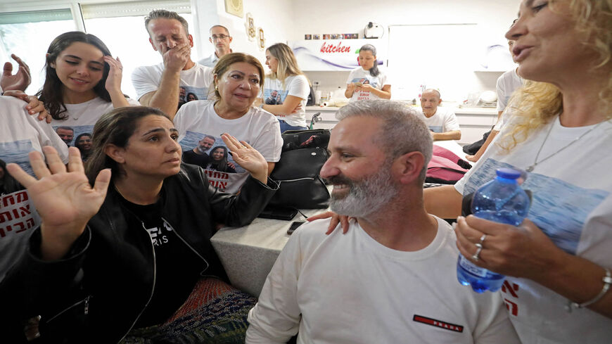 Israeli couple Natalie and Mordi Oknin, who were held in Turkey for a week on suspicion of espionage, are greeted upon their arrival home following their release, Modi'in, Israel, Nov. 18, 2021.