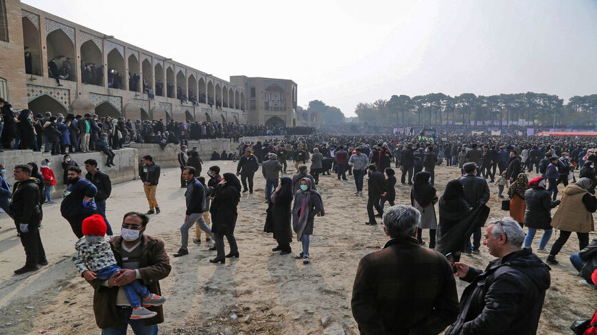 Iranians gather during a protest to voice their anger after their province's lifeblood river dried up due to drought and diversion, in the central city of Esfahan, Iran, Nov. 19, 2021.