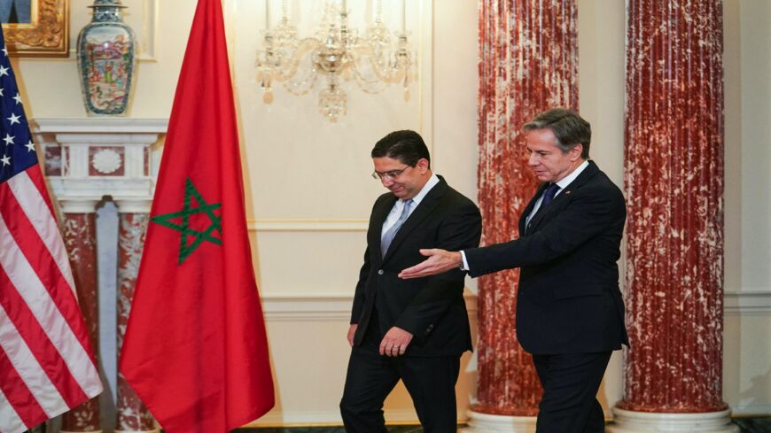 US Secretary of State Antony Blinken welcomes Morocco's Foreign Minister Nasser Bourita (L) to address the media at the State Department in Washington, DC, on Nov. 22, 2021.