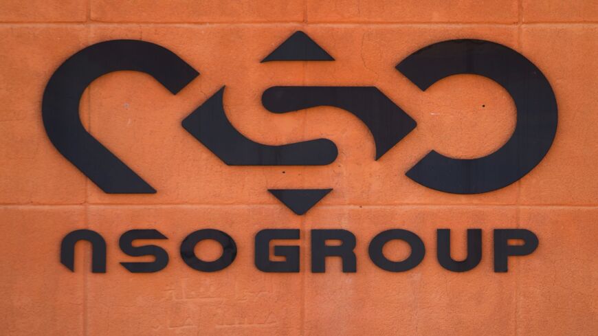 The logo of Israeli cyber company NSO Group is seen at one of its branches in the Arava Desert on Nov. 11, 2021, in Sapir, Israel.