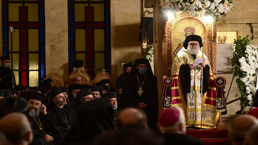 Bishop Ephraim Maalouli (R) speaks at a ceremony, after he was appointed as the new metropolitan of the Greek Orthodox archieparchy of Aleppo and Alexandretta, at Saint Elias Cathedral, Aleppo, Syria, Dec. 10, 2021.
