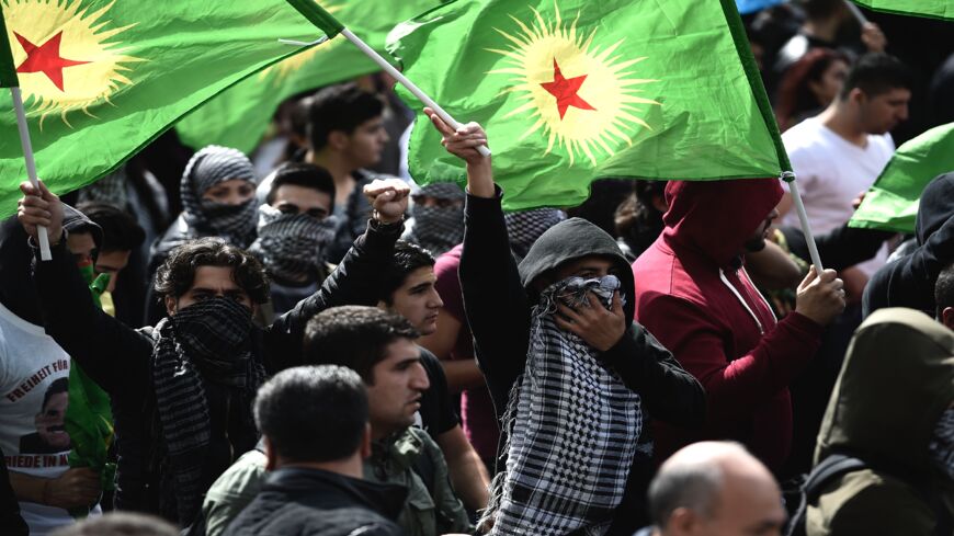 Members of the PKK are pictured during a peaceful protest against ongoing attacks against Yazidis in northern Iraq, on Aug. 16, 2014, in Hanover, Germany. 