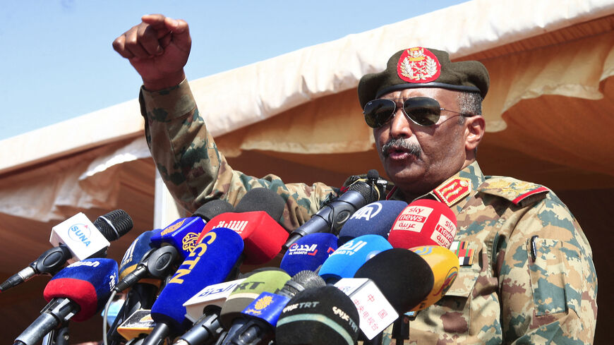 Sudan's top Gen. Abdel Fattah al-Burhan speaks as he attends the conclusion of a military exercise in the Maaqil area, northern Nile River State, Sudan, Dec. 8, 2021.