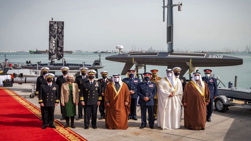 Image released by US Naval Forces Central Command on Jan. 31, 2022, shows Prince Salman bin Hamad al-Khalifa (C); Vice Admiral Brad Cooper (C-L); and Maggie Nardi (2nd-L), charge d'affairs, US Embassy to Bahrain, at Naval Support Activity (NSA) Bahrain.