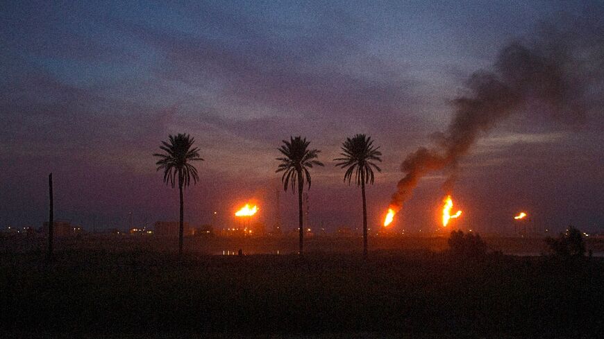 Analysts say the wasted flared gas, such as pictured in the Nahr Bin Omar oil field, is particularly egregious as Iraq is a significant importer of natural gas