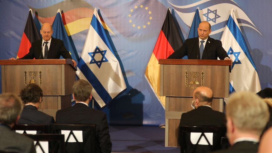 Israel's Prime Minister Naftali Bennett, on the right, and German Chancellor Olaf Scholz give a joint press conference at the King David Hotel in Jerusalem on March 2, 2022