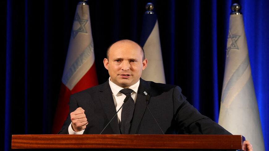 Israeli Prime Minister Naftali Bennett gives a speech during a ceremony for the Jewish holiday of Hanukkah for Israeli soldiers, Jerusalem, Nov. 29, 2021.