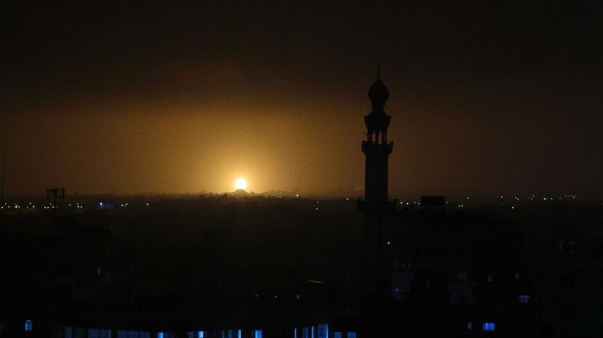 Flames and smoke rise during Israeli airstrikes in Rafah in the southern Gaza Strip