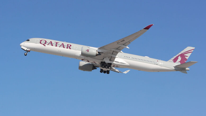 A Qatar Airways Airbus A350 airplane takes off from Hamad International Airport near the Qatari capital, Doha, on Jan. 11, 2021.