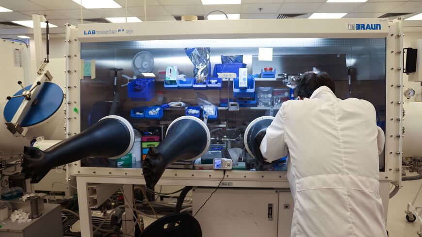 An employee works at StoreDot's headquarters in the Israeli coastal city of Herziliya on Feb. 16, 2021. 